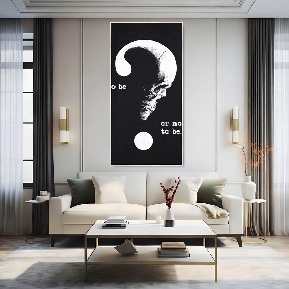 Tablou canvas cu tablou canvas cu craniu si semnul intrebarii, in rama de aluminiu argintiu, pe perete intr-un living